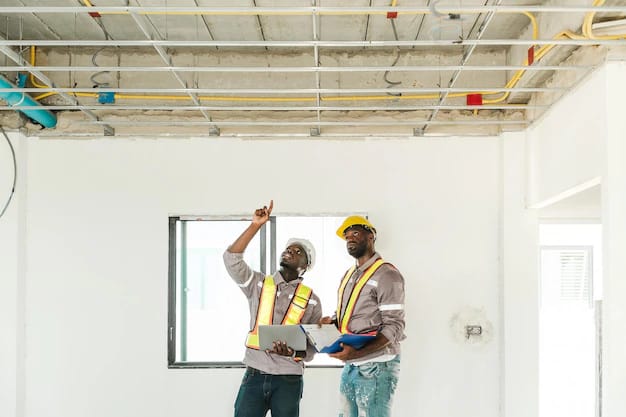 Overhead mechanical and electrical services set out above a ceiling grid